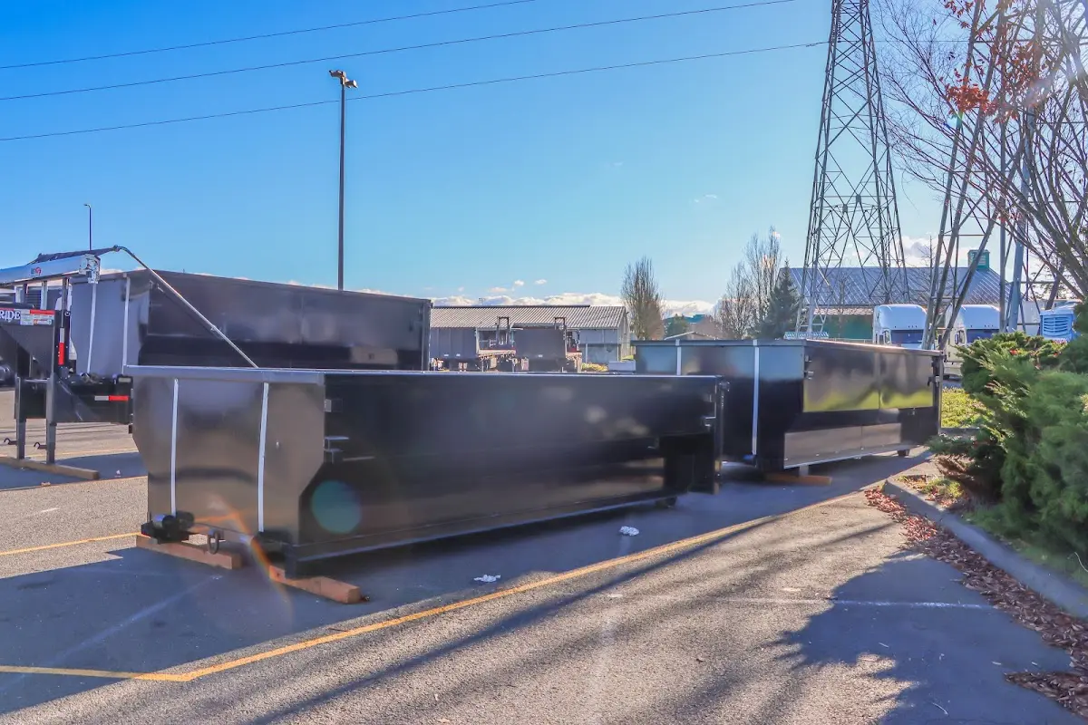 Roll-off dumpster ready for waste disposal at job site for 12 Yard Dumpster Rental in Waunakee